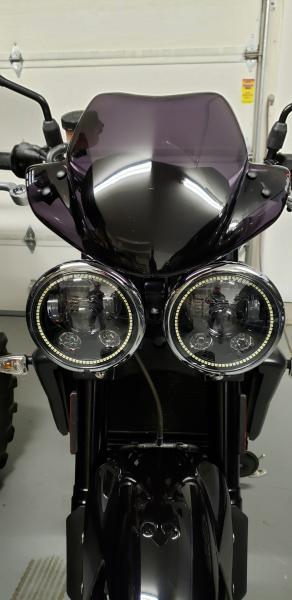 Name:  Triumph speed triple w Wisamic lights and Puig fly screen.jpg
Views: 359
Size:  27.4 KB